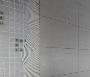 installing tile over tiles wall