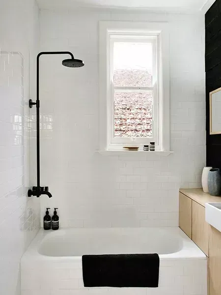 bath with white subway tiles