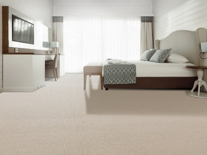 Bedroom with sandy coloured carpet