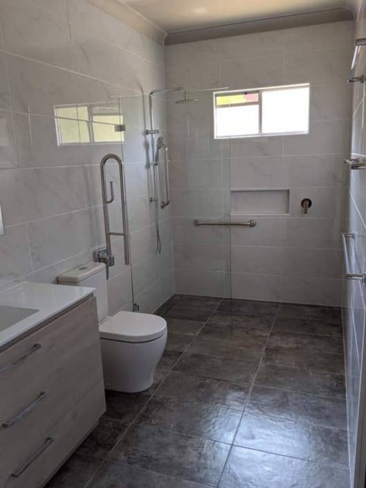 Bathroom featuring Cement 36DG Floor and Campania Carrara Walls 2