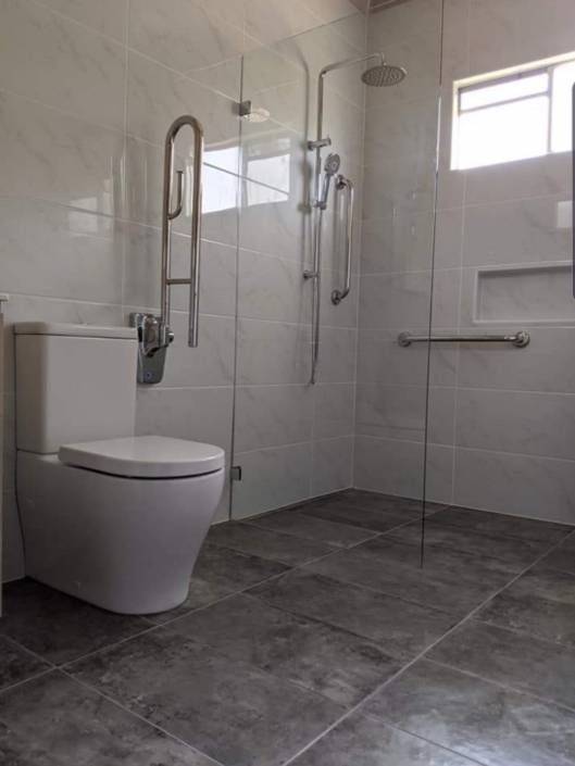 Bathroom featuring Cement 36DG Floor and Campania Carrara Walls 3